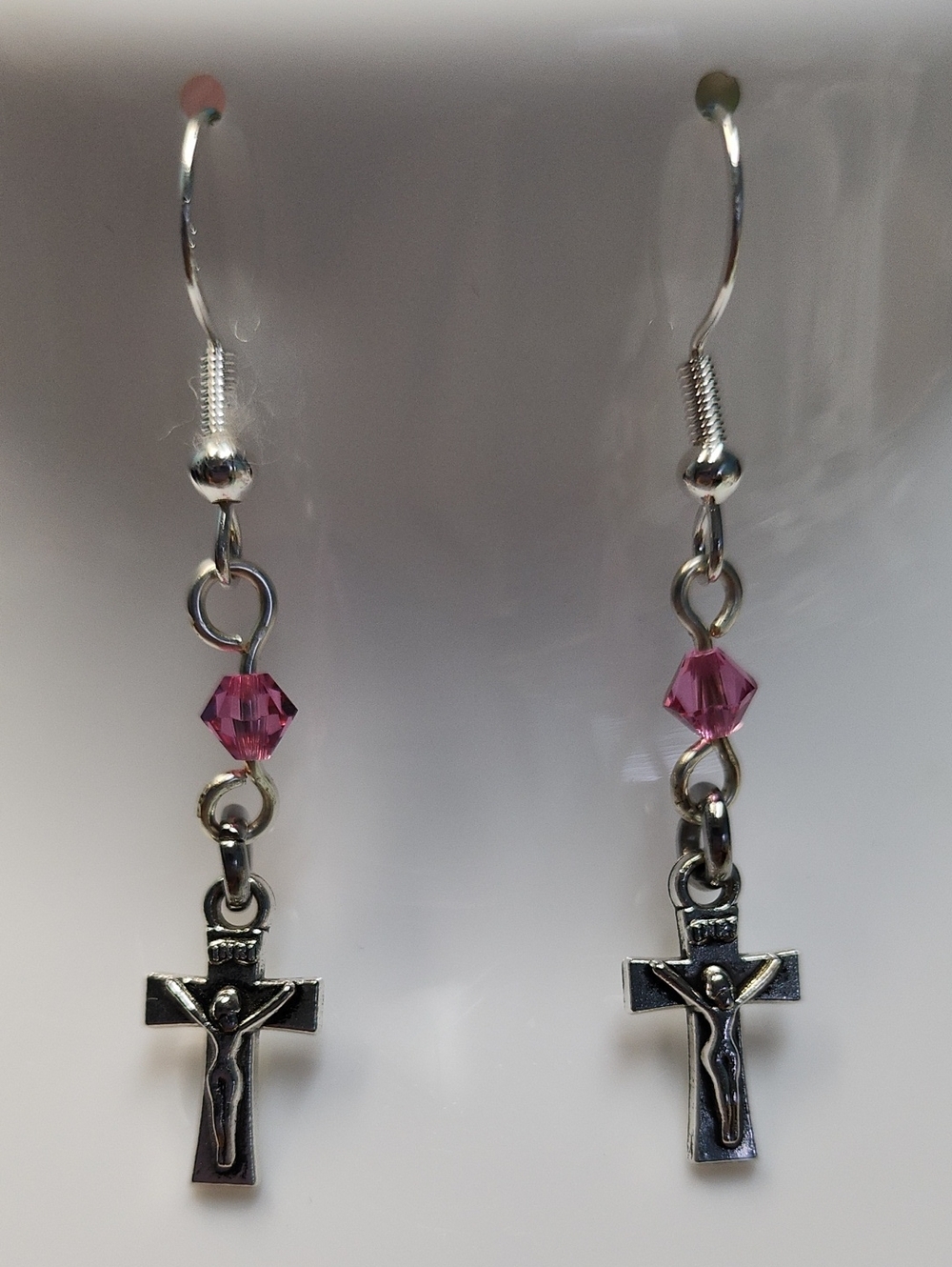 Silver Crucifix Earrings with Pink Crystal Accents